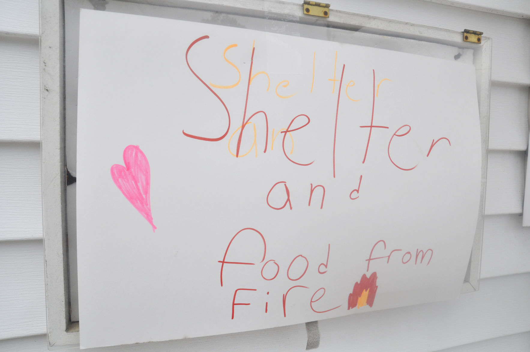 Church sign after Pebblebrook Apartments fire